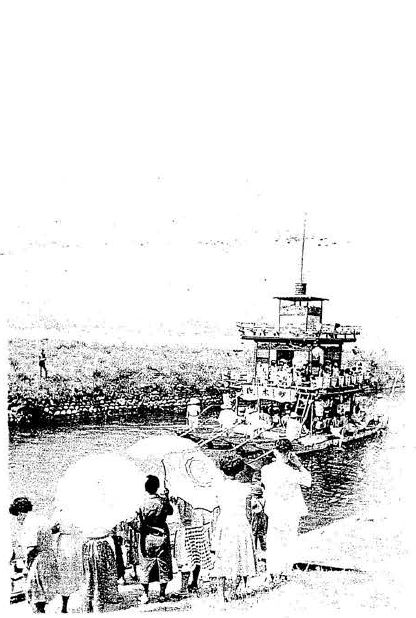 材木町から木津用水を遡上する「豊光丸」